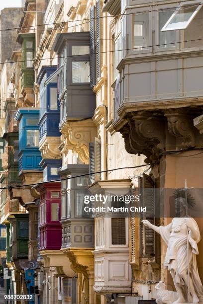 statue on tirq san pawl (st. paul street) in old valletta, unesco world heritage site and european capital of culture 2018, malta, mediterranean, europe - european capital of culture stock pictures, royalty-free photos & images