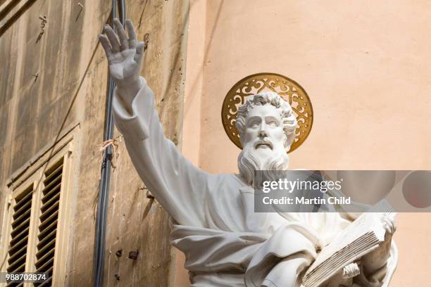 statue on tirq san pawl (st. paul street) in old valletta, unesco world heritage site and european capital of culture 2018, malta, mediterranean, europe - european capital of culture stock pictures, royalty-free photos & images