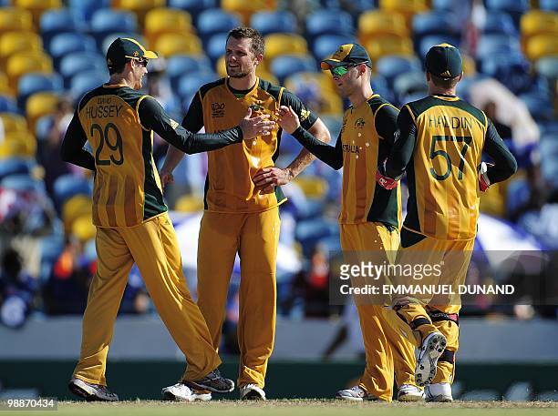 Australian players celebrate after taking the wicket of Bangladeshi batsman Jahurul Islam during the ICC World Twenty20 Group A match between...