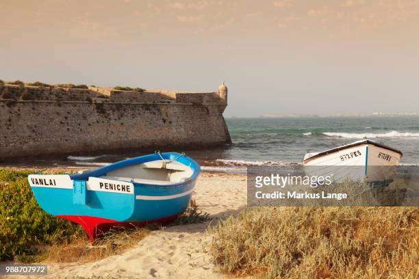 fishing boats at sunset, peniche, atlantic ocean, leiria, portugal, europe - peniche stock pictures, royalty-free photos & images