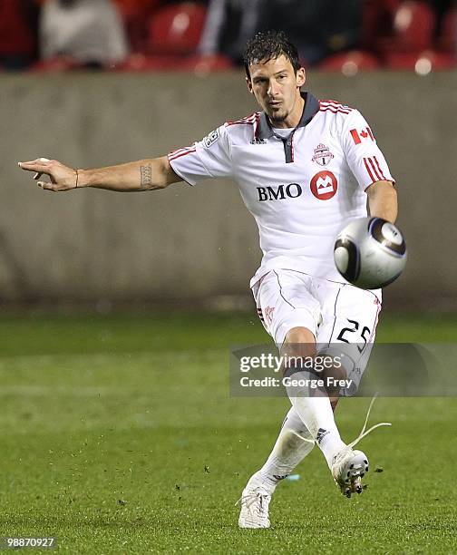 Martin Saric of Toronto FC kicks the ball during the game against Real Salt Lake at Rio Tinto Stadium on May 1, 2010 in Sandy, Utah. Real Salt Lake...