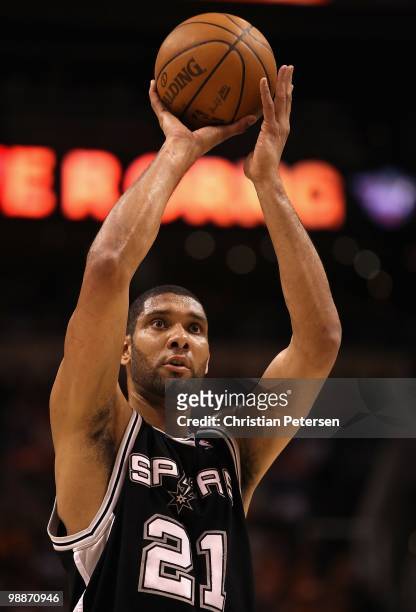 Tim Duncan of the San Antonio Spurs shoots a free throw shot against the Phoenix Suns during Game One of the Western Conference Semifinals of the...
