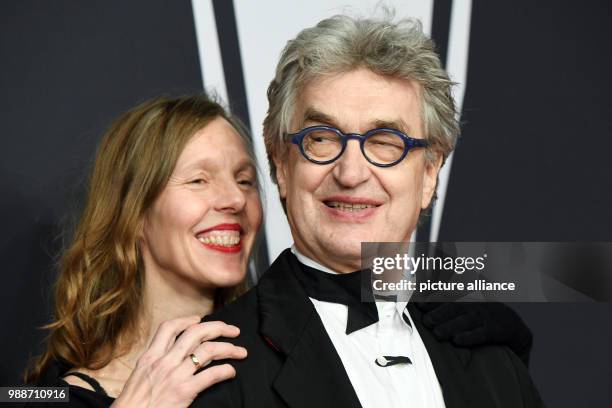 The film director Wim Wenders and his wife Donata Wenders arrive for the award ceremony of the 30th European Film Awards in Berlin, Germany, 9...