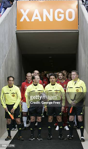 Game officials Nate Clement, Kevin Stott, Ramon Hernandez and Steven Taylor wait to enter the field before the Toronto FC game against Real Salt Lake...