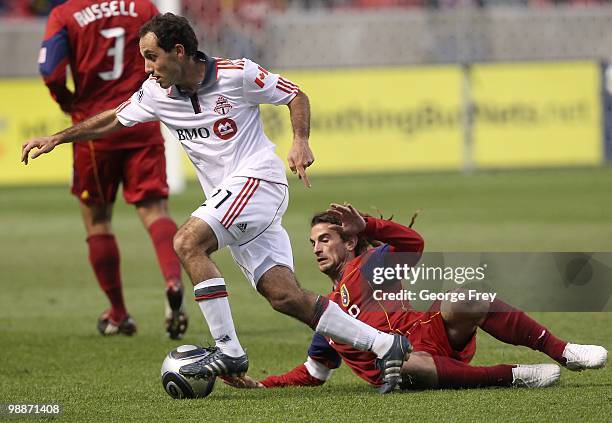 Gabe Gala of Toronto FC takes the ball from Kyle Beckerman of Real Salt Lake during the game at Rio Tinto Stadium on May 1, 2010 in Sandy, Utah. Real...