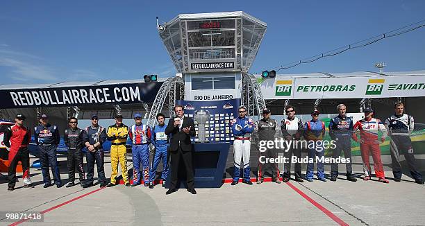 Pilots stand next to Red Bull Air Race CEO Bernd Loidl during the official presentation for the Red Bull Air Race Rio 2010 on May 5, 2010 in Rio de...