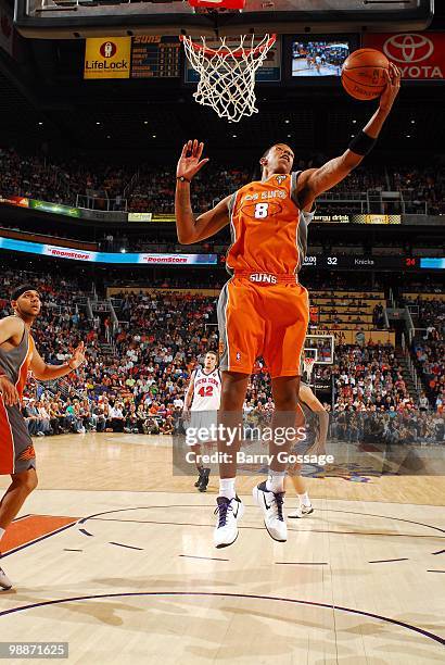 Channing Frye of the Phoenix Suns makes a rebound against the New York Knicks during the game at U.S. Airways Center on March 26, 2010 in Phoenix,...