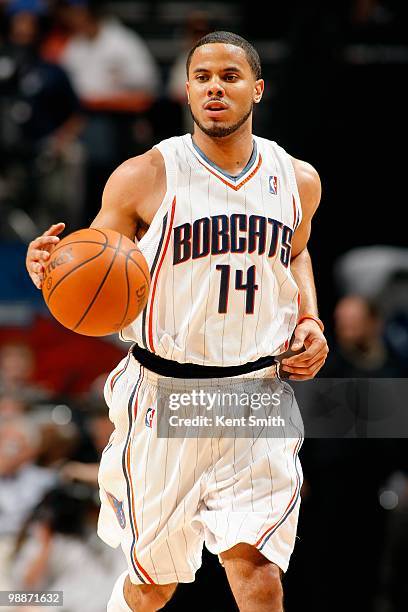 Augustin of the Charlotte Bobcats drives the ball up court in Game Four of the Eastern Conference Quarterfinals against the Orlando Magic during the...