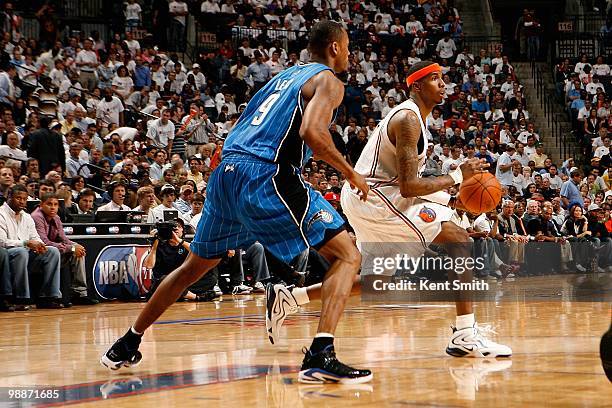 Tyrus Thomas of the Charlotte Bobcats moves past Rashard Lewis of the Orlando Magic in Game Four of the Eastern Conference Quarterfinals during the...