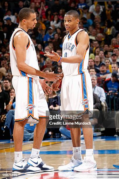Thabo Sefolosha and Russell Westbrook of the Oklahoma City Thunder talk together on the court during the game against the Utah Jazz on March 14, 2010...