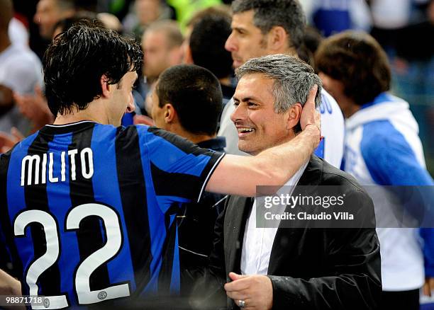 Diego Milito and head coach Jose Mourinho of Inter Milan celebrate after the Tim Cup final between FC Internazionale Milano and AS Roma at Stadio...