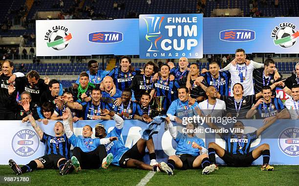 Internazionale Milano players celebrate with the trophy after the Tim Cup final between FC Internazionale Milano and AS Roma at Stadio Olimpico on...