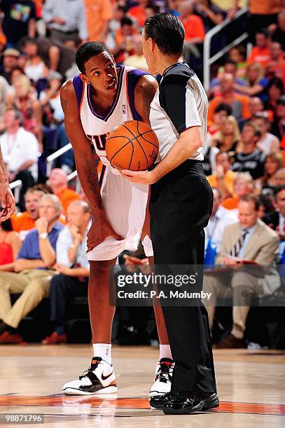 Channing Frye of the Phoenix Suns talks to referee Ken Mauer in Game One of the Western Conference Semifinals against the San Antonio Spurs during...