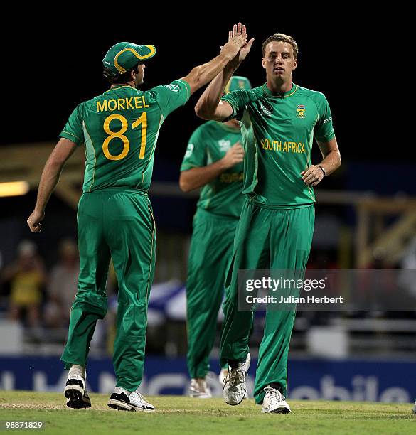 Morne Morkel is congratulated by Albie Morkel for the wicket of Nowroz Mangal of Afghanistan during The ICC World Twenty20 Group C Match between...