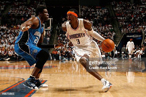 Gerald Wallace of the Charlotte Bobcats drives to the basket past Mickael Pietrus of the Orlando Magic in Game Four of the Eastern Conference...