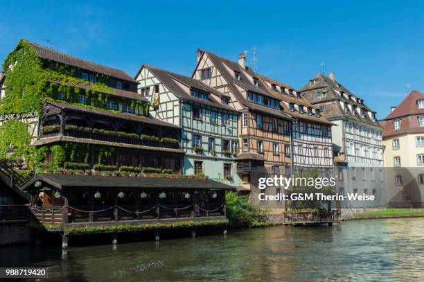 timbered houses along the quai de la petite france, ill canal, unesco world heritage site, strasbourg, alsace, bas-rhin department, france, europe - bas rhin stock pictures, royalty-free photos & images