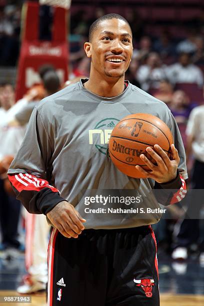 Derrick Rose of the Chicago Bulls looks on with a smile during warm-ups prior to the game against the New Jersey Nets at the IZOD Center on April 9,...