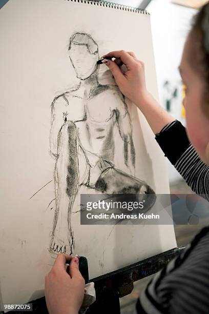 teenage girl drawing a picture of nude man. - carbon paper stock pictures, royalty-free photos & images