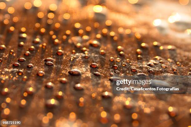 copper drops / gotas de cobre - cobre stock-fotos und bilder