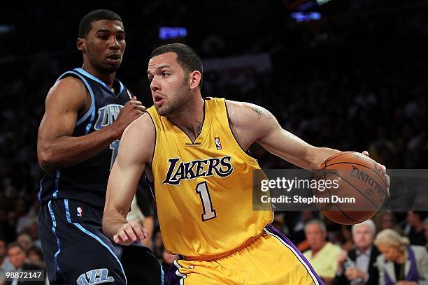 Jordan Farmar of the Los Angeles Lakers drives on Ronnie Price of the Utah Jazz during Game Two of the Western Conference Semifinals of the 2010 NBA...