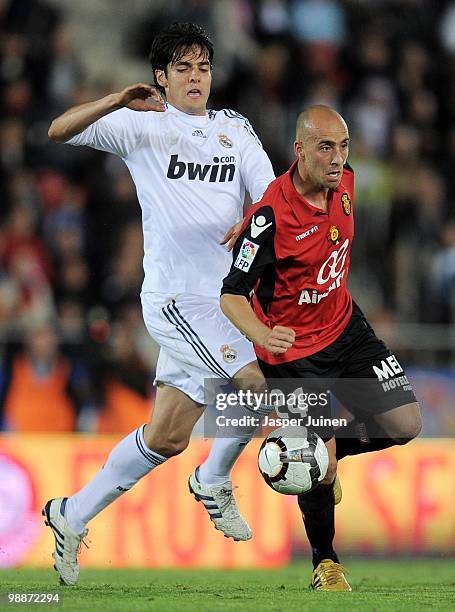Borja Valero of Mallorca fights for the ball with Kaka of Real Madrid during the La Liga match between Mallorca and Real Madrid at the ONO Estadio on...