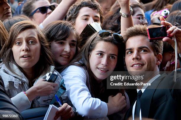 Actor Gonzalo Ramos greets fans at the "Fisica o quimica" fifth season photocall at Capitol cinema on May 5, 2010 in Madrid, Spain.