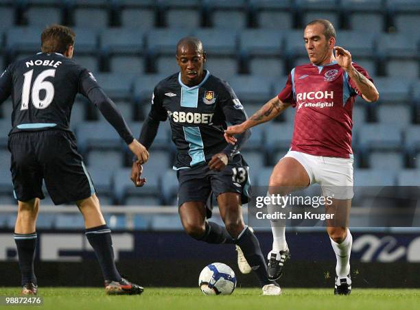 Paolo Di Canio of the Academy All-Stars competes with Luis Boa Morte and Mark Noble of West Ham United during the Tony Carr Testimonial match between...