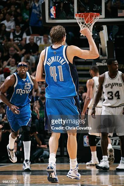 Dirk Nowitzki of the Dallas Mavericks celebrates after a play against the San Antonio Spurs in Game Three of the Western Conference Quarterfinals...