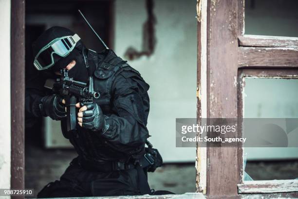 special forces - police hat stock pictures, royalty-free photos & images