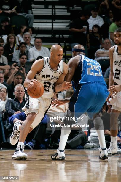 Richard Jefferson of the San Antonio Spurs drives against Erick Dampier of the Dallas Mavericks in Game Three of the Western Conference Quarterfinals...