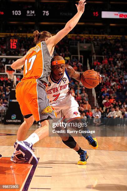 Al Harrington of the New York Knicks drives the ball against Louis Amundson the Phoenix Suns during the game at U.S. Airways Center on March 26, 2010...