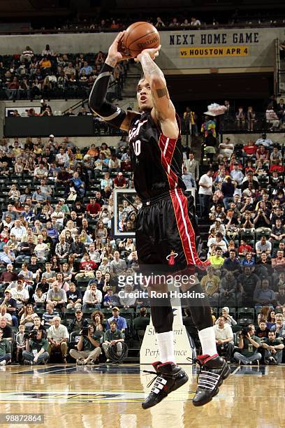 Michael Beasley of the Miami Heat makes a jumpshot against the Indiana Pacers during the game at Conseco Fieldhouse on April 2, 2010 in Indianapolis,...