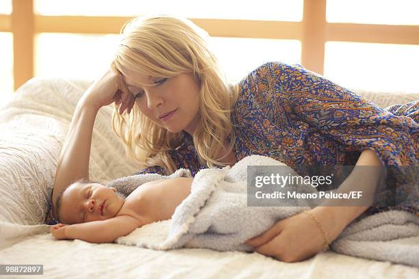 Actress Jenna Elfman poses with her new son Easton Elfman during a photo shoot on March 24, 2010 in Los Angeles, California.