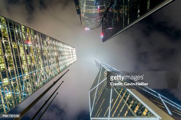 low angle view of skyscrapers in central, hong kong island, hong kong, china, asia - gavin hellier bildbanksfoton och bilder