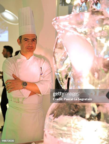 Head Pastry Chef of the Fouquet's restaurant, Claude Ducrozet, poses in front of an Ice sculpture during the 1.618 sustainable luxury fair at Palais...