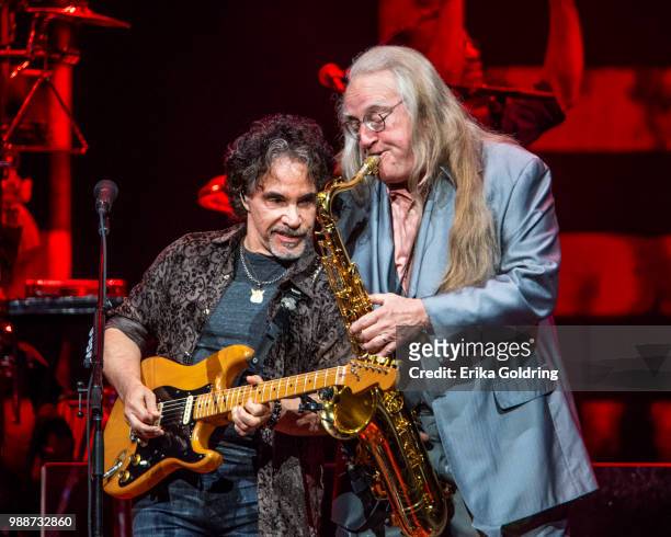 John Oates and Charles DeChant of Hall & Oates perform at Smoothie King Center on June 28, 2018 in New Orleans, Louisiana.