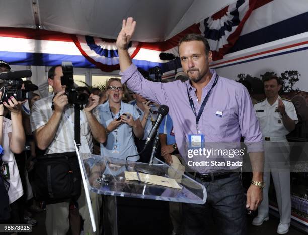 Recording artist Tim McGraw visits families of the Arm Forces at the Patriot's Outpost during the Military Appreciation Ceremony prior to the start...