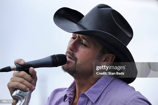 Recording artist Tim McGraw performs during the Military Appreciation Ceremony prior to the start of THE PLAYERS Championship on THE PLAYERS Stadium...