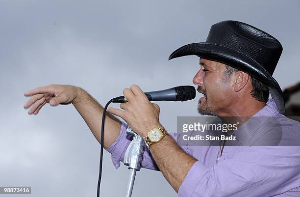 Recording artist Tim McGraw performs during the Military Appreciation Ceremony prior to the start of THE PLAYERS Championship on THE PLAYERS Stadium...