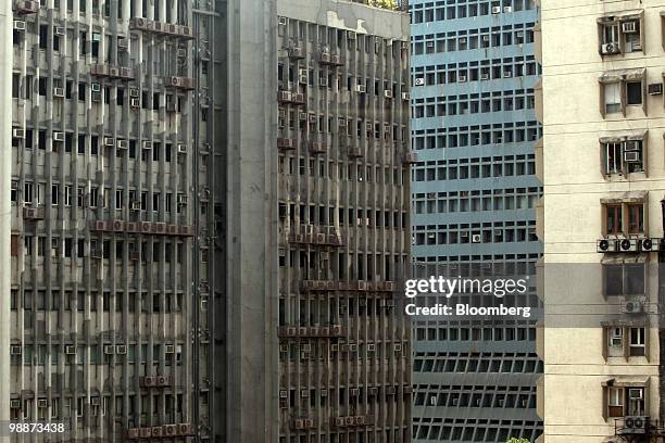 Discolored and chipping paint covers the office buildings in the Nariman Point financial district of Mumbai, India, on Friday, April 30, 2010. UBS AG...