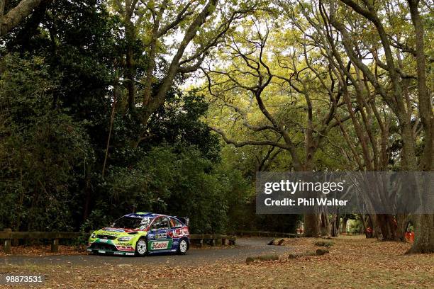 Jari-Matti Latvala and co-driver Miikka Antilla of Finland drive their Ford Focus RS through the streets of the Auckland Domain during the WRC Rally...