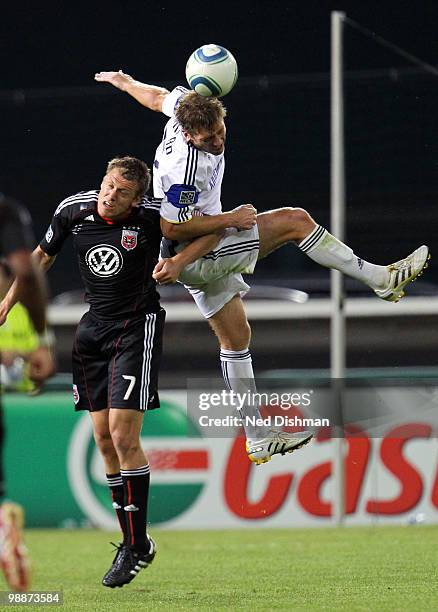 Jimmy Conrad of the Kansas City Wizards wins a header against Adam Christman of D.C. United at RFK Stadium on May 5, 2010 in Washington, DC.