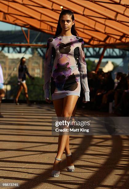 Model Samantha Harris showcases designs on the runway at the Dion Lee collection show on the fourth day of Rosemount Australian Fashion Week...