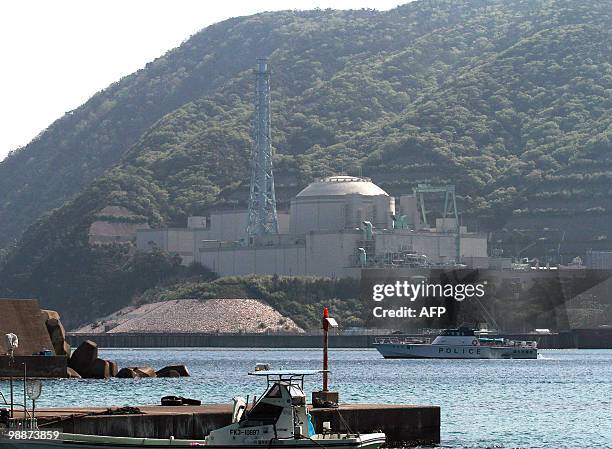 Police boat patrols around the nuclear reactor Monju in Tsuruga, Fukui prefecture on May 6, 2010. The Japan Atomic Energy Agency is scheduled to...