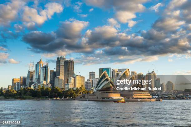 the skyline of sydney at sunset, new south wales, australia, pacific - sydney opera house people stock pictures, royalty-free photos & images