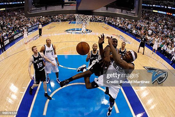 DeJuan Blair of the San Antonio Spurs block a shot by Brendan Haywood of the Dallas Mavericks in Game Five of the Western Conference Quarterfinals...