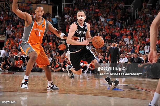 Manu Ginobili of the San Antonio Spurs drives against Channing Frye of the Phoenix Suns in Game Two of the Western Conference Semifinals during the...