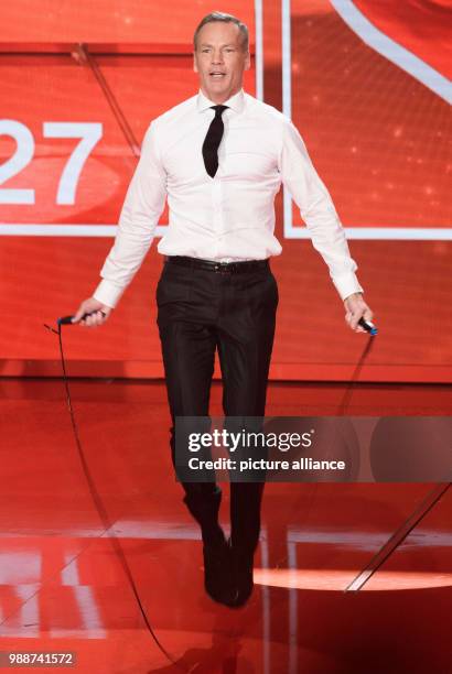 Former boxer Henry Maske jumping a rope during the charity gala "A heart for children" in Berlin, Germany, 09 December 2017. Photo: Gregor Fischer/dpa