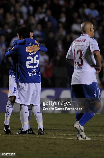 Diego Renan of Cruzeiro celebrates a scored goal with teammate Kleber during a match against Nacional as part of the Libertadores Cup 2010 at Central...