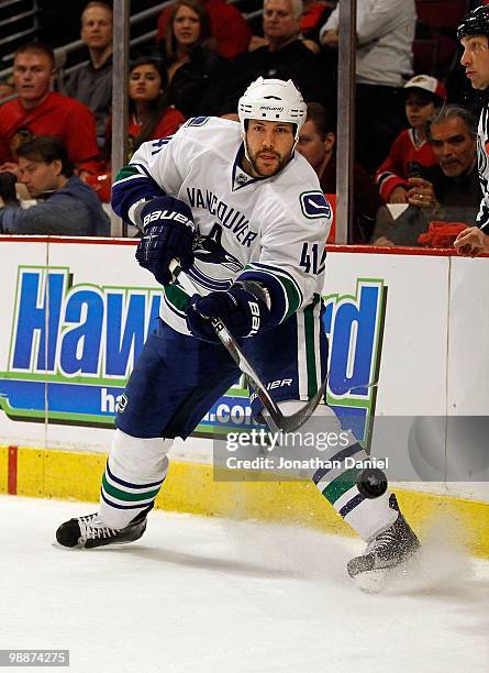 Andrew Alberts of the Vancouver Canucks passes the puck against the Chicago Blackhawks in Game Two of the Western Conference Semifinals during the...